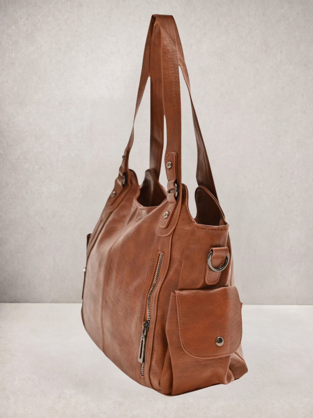 L'Elyn tote bag in camel vegan leather, angled view