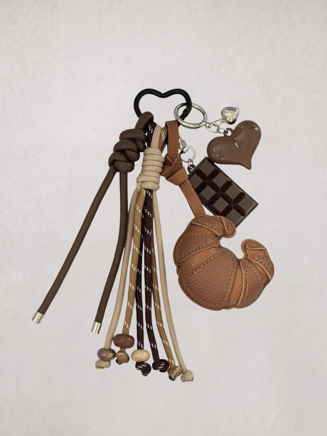 Croissant Charm keychain with heart and chocolate bar charm, product shot