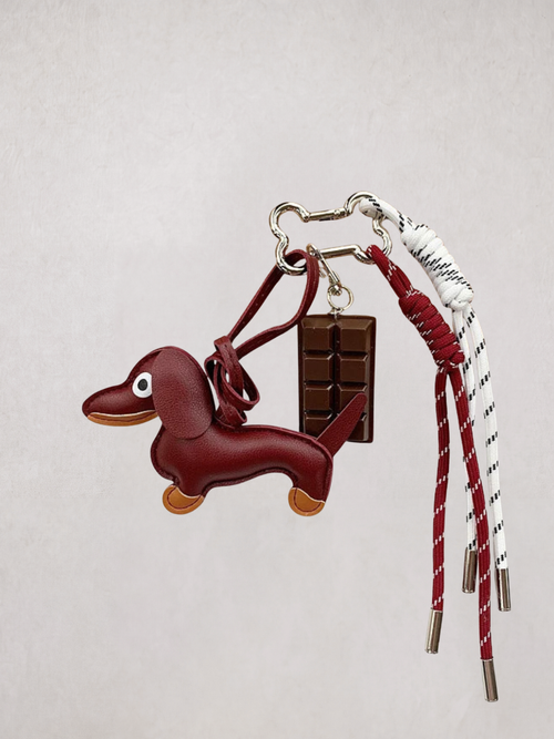 Dachshund Charm keychain in burgundy, with chocolate bar charm, product shot