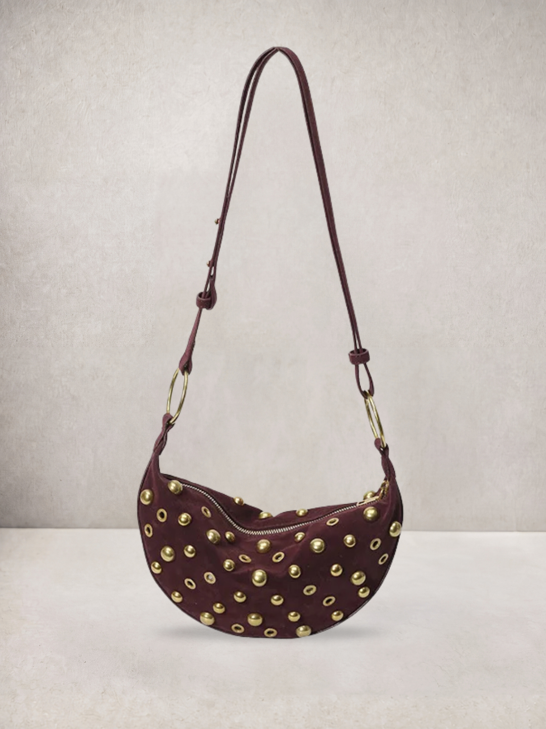 L'Anya bag in wine red vegan leather with gold stud details, front view