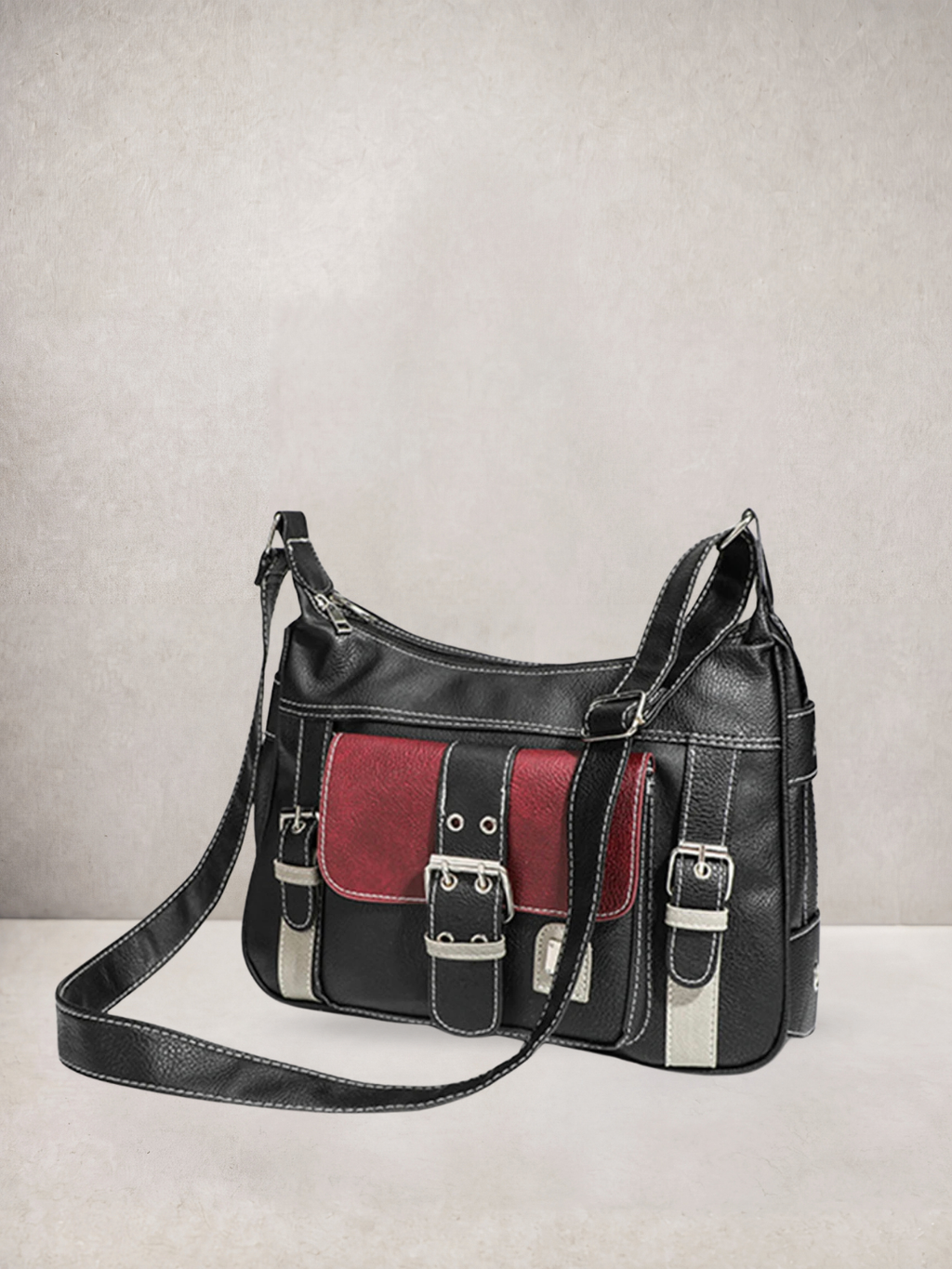 Le Chloé crossbody bag in black vegan leather with red and cream color-block details, front view