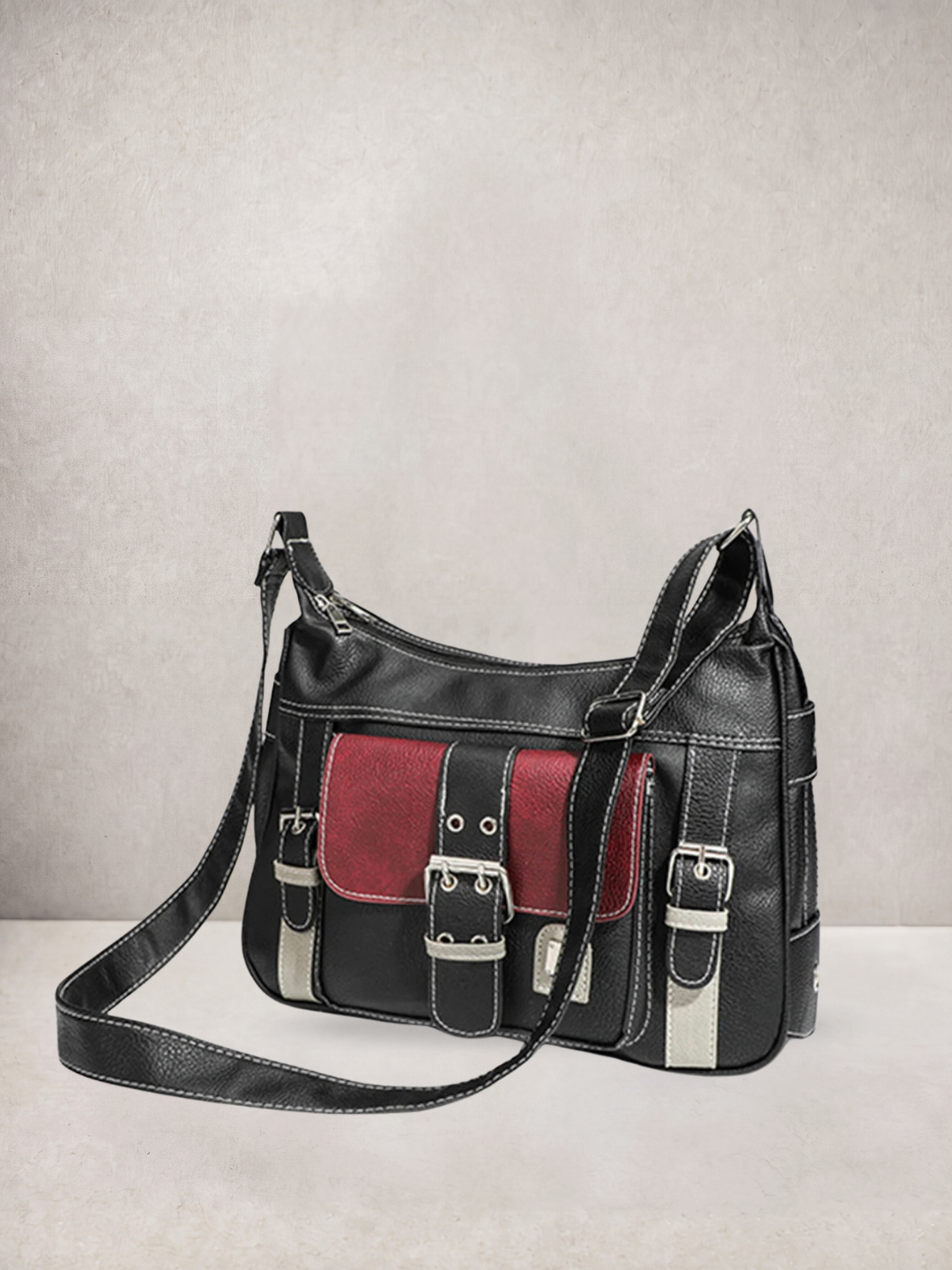 Le Chloé crossbody bag in black vegan leather with red and cream color-block details, front view