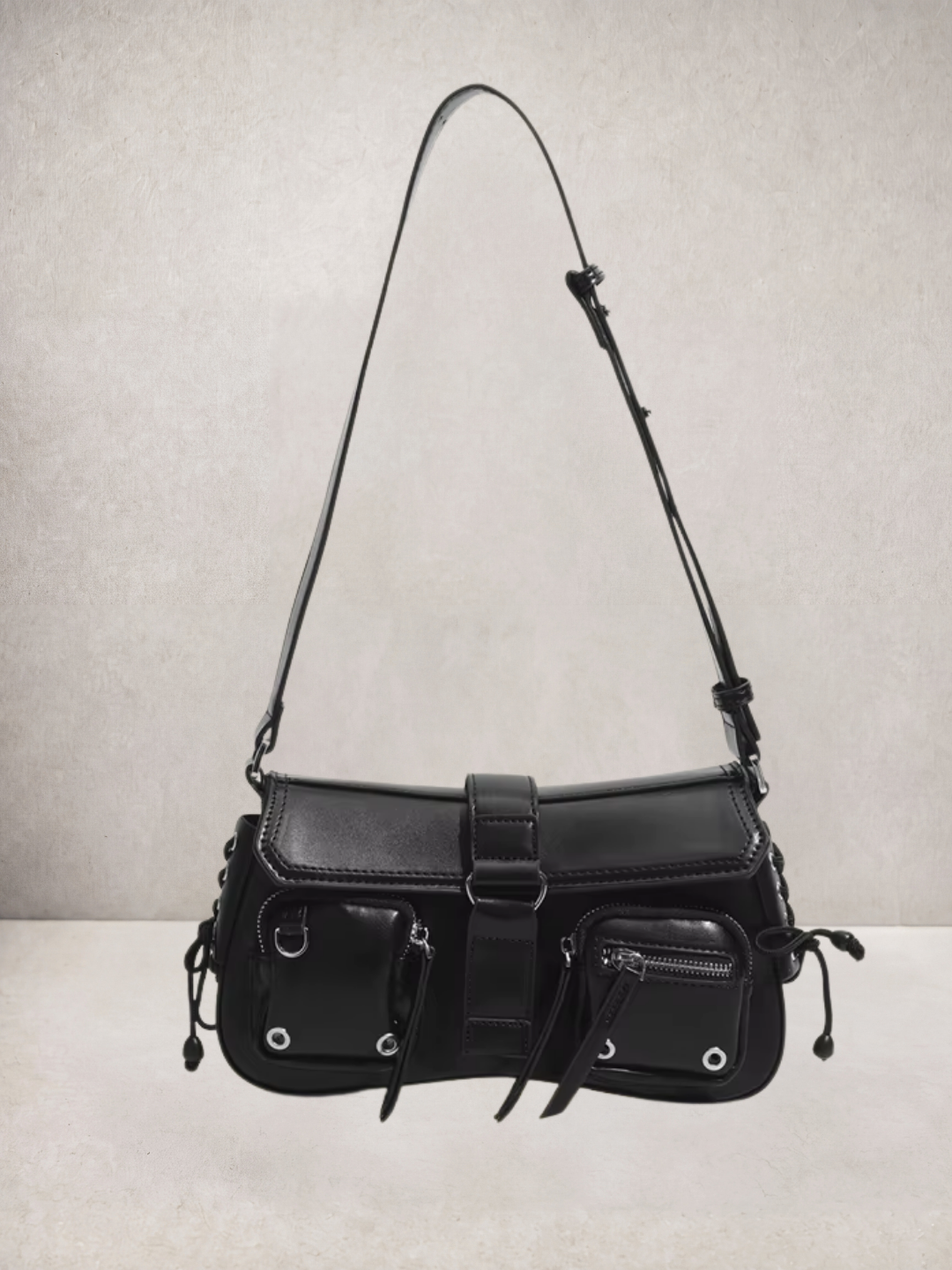 Le Lune bag in black vegan leather with cargo pockets, front view