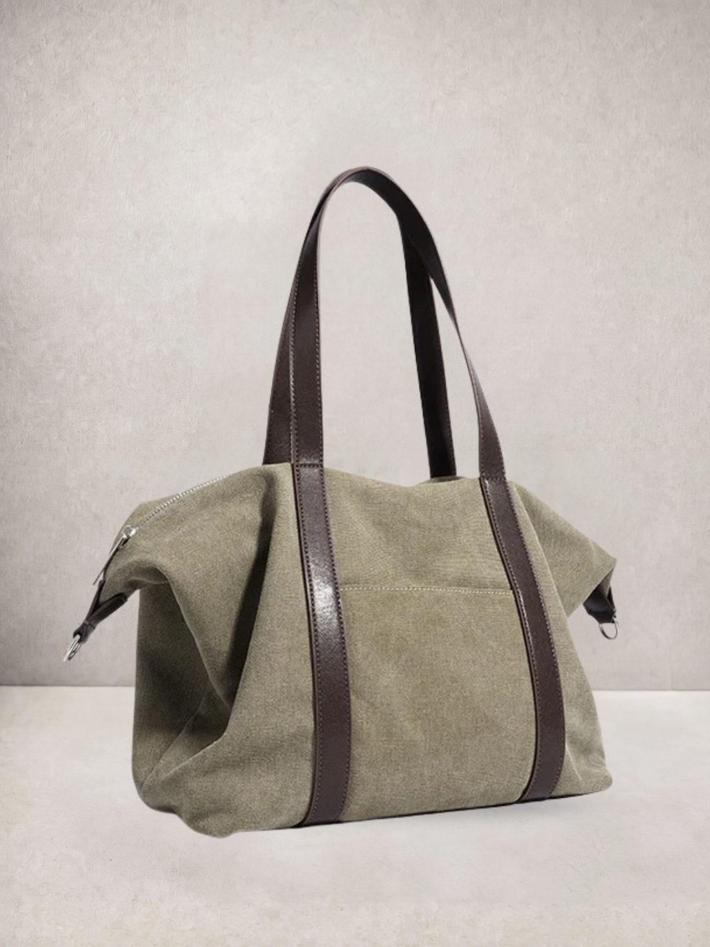 Le Meline tote bag in green canvas with brown leather straps, front view