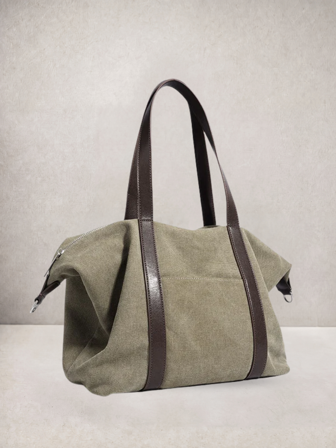 Le Meline tote bag in green canvas with brown leather straps, front view