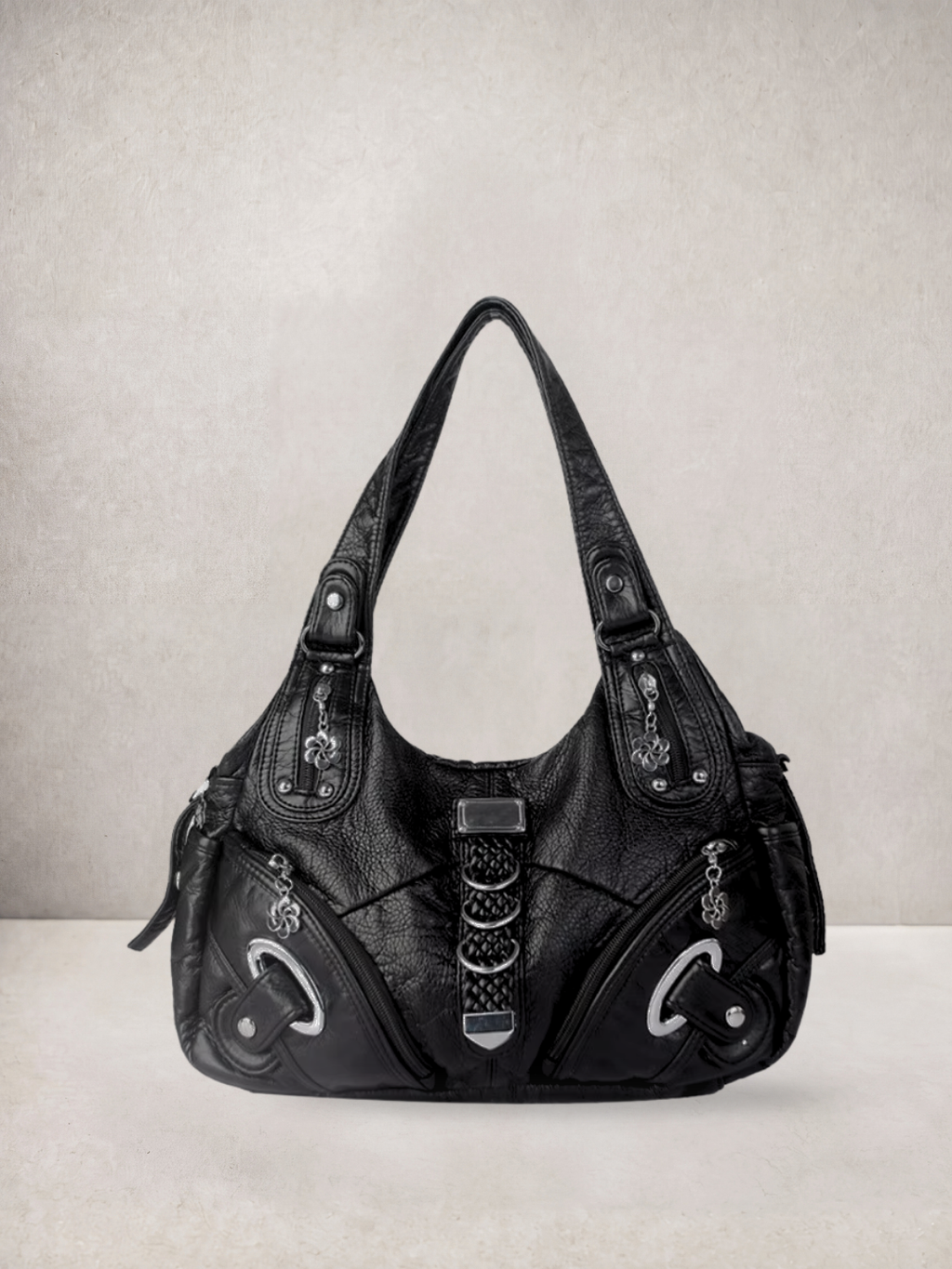 Le Nyx hobo bag in black vegan leather with silver hardware, alternate front view
