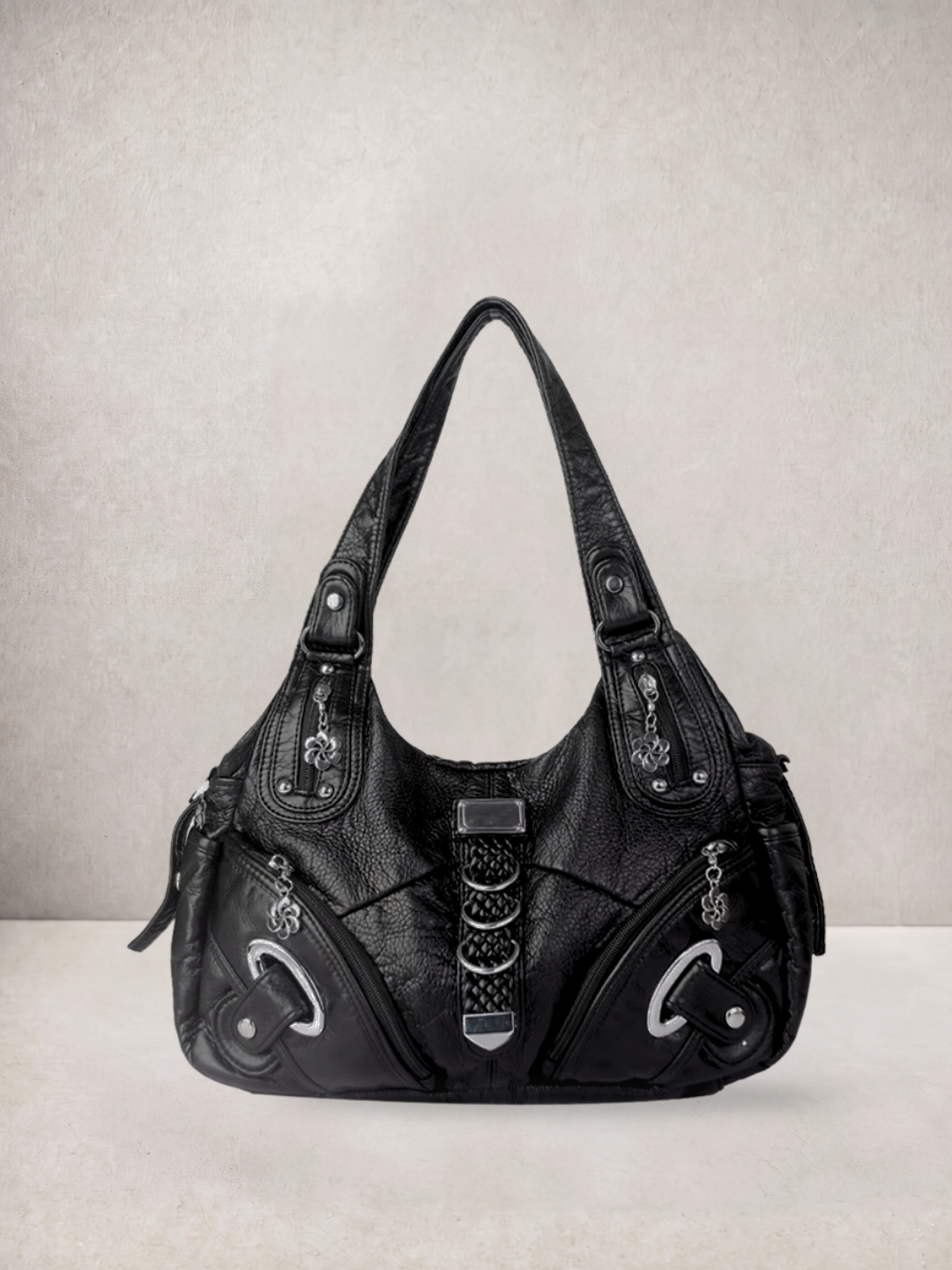 Le Nyx hobo bag in black vegan leather with silver hardware, alternate front view