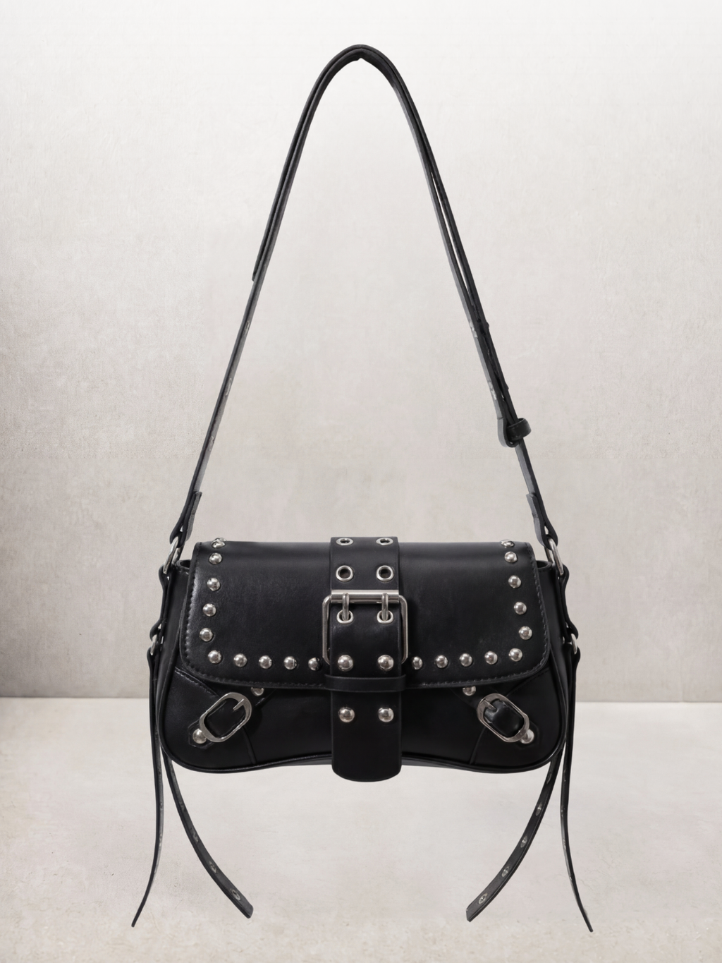 Le Robin bag in black vegan leather with stud details, front view