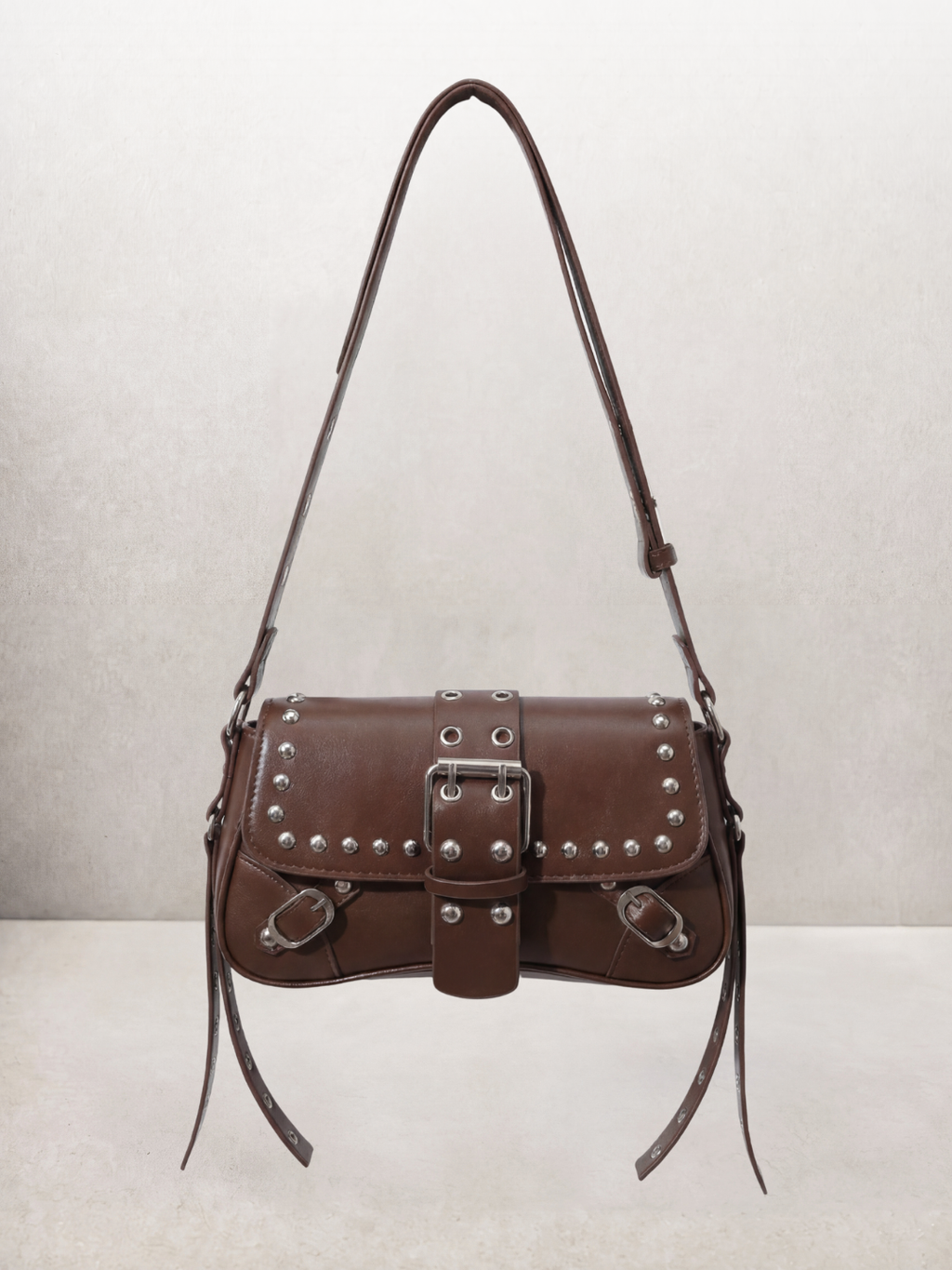 Le Robin bag in coffee vegan leather with stud details, front view