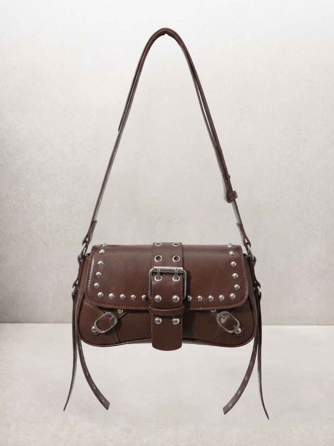 Le Robin bag in coffee vegan leather with stud details, front view
