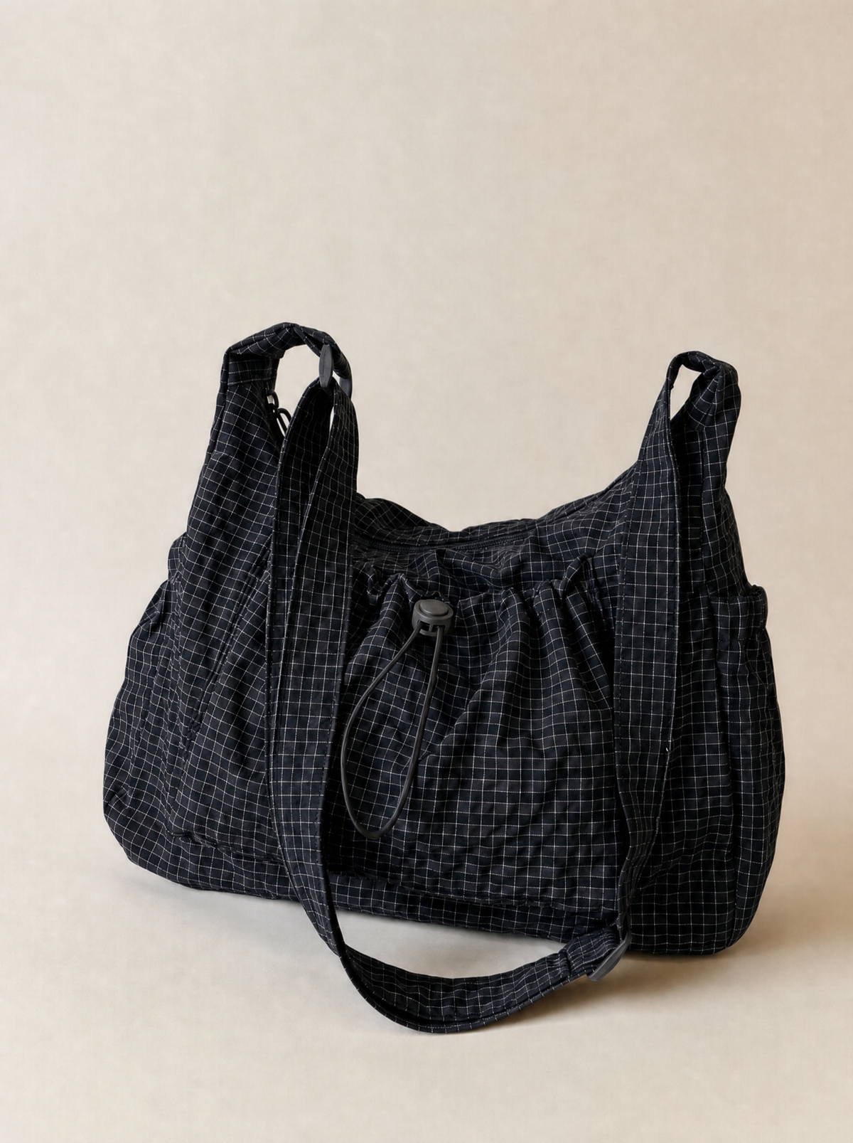 Le Rue hobo bag in black vegan leather, side view