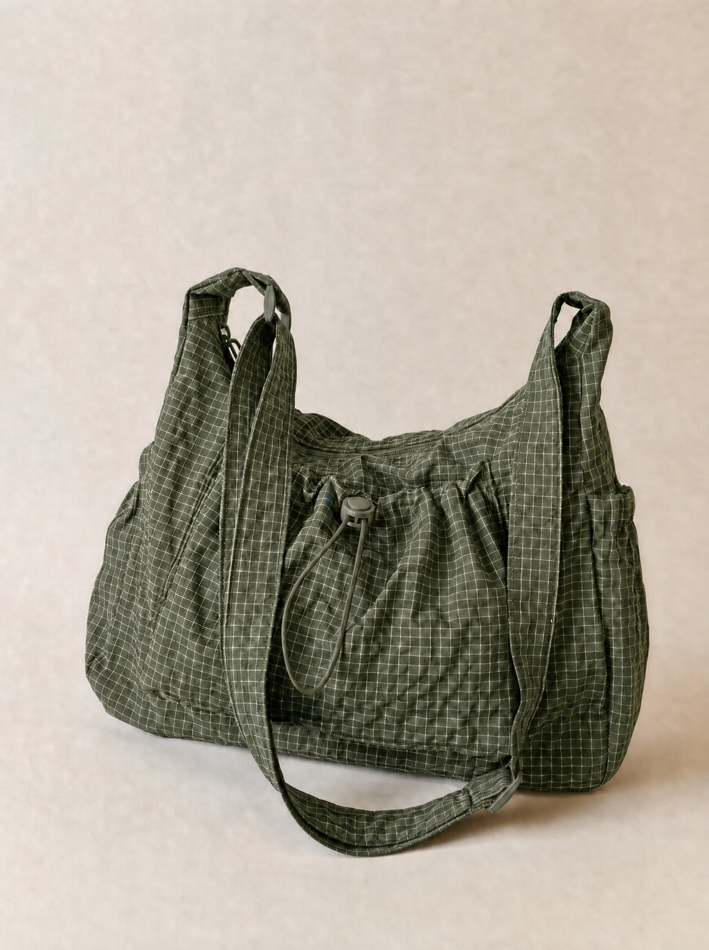 Le Rue hobo bag in green vegan leather, front view