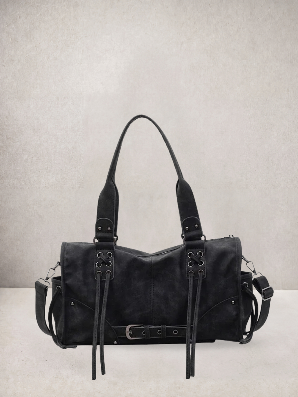 Le Stormie tote bag in black vegan leather with fringe tassel straps, front view