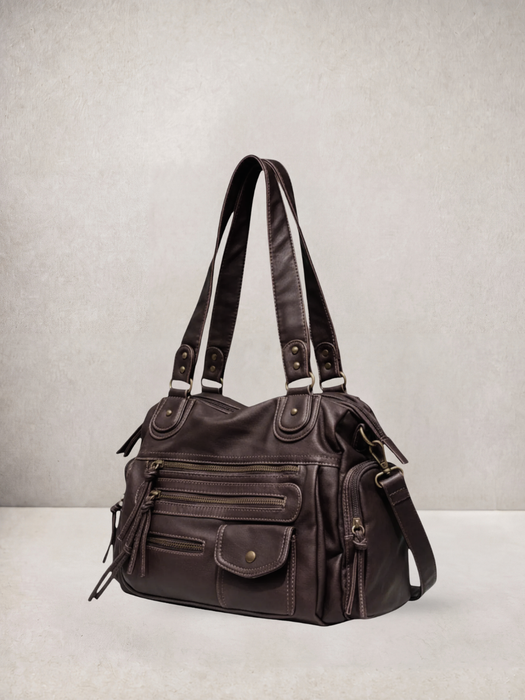 Le Vienne tote bag in dark brown vegan leather with multiple front pockets, front view
