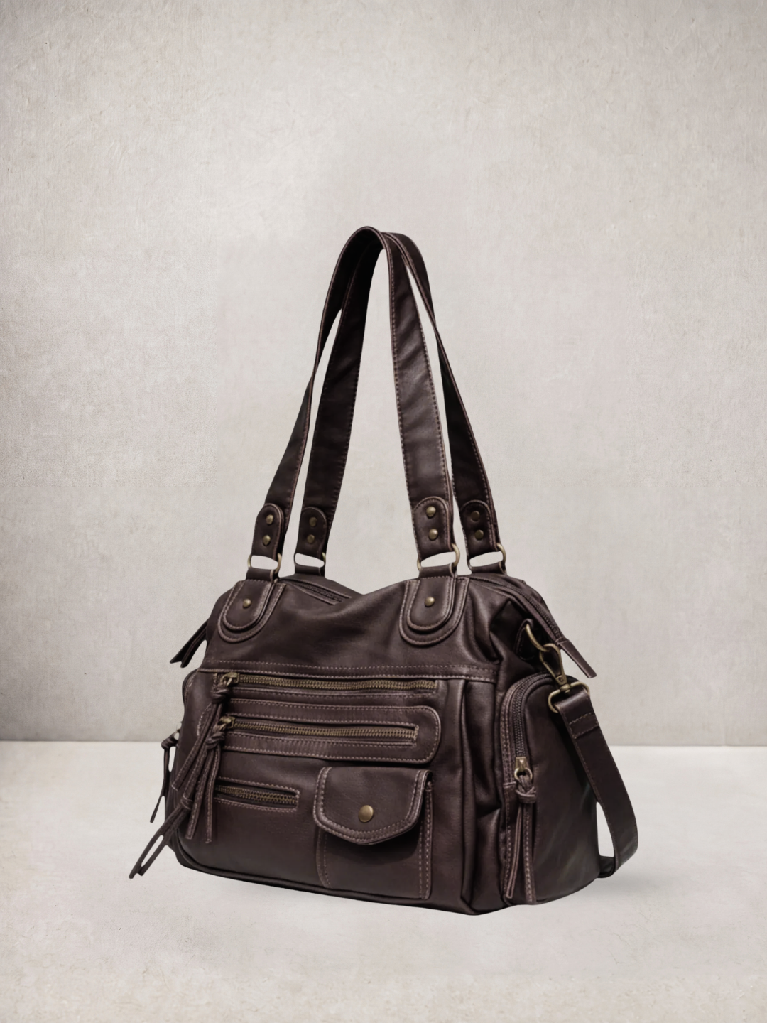 Le Vienne tote bag in dark brown vegan leather with multiple front pockets, front view