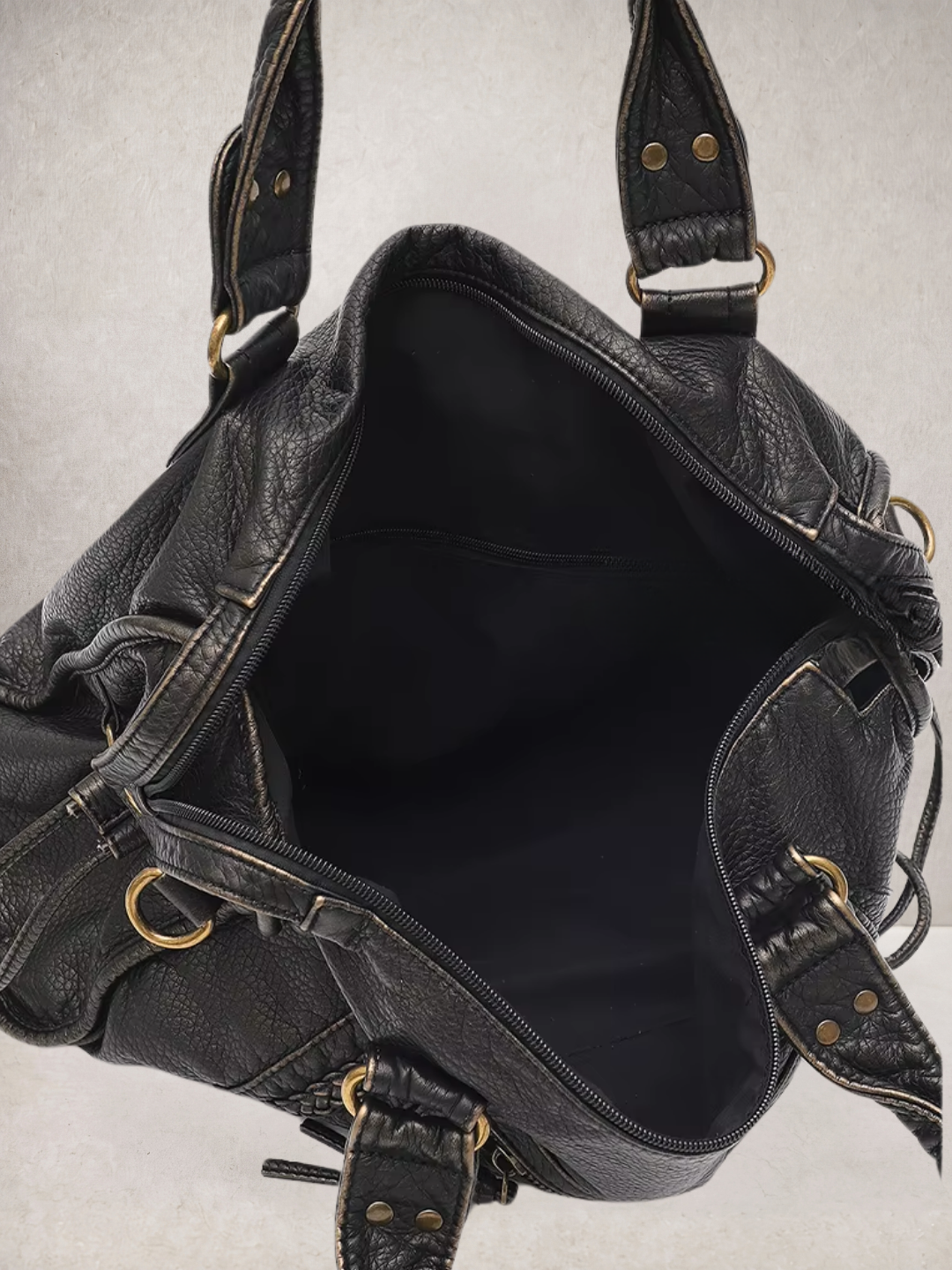 Le Rogue black bag open showing the spacious interior