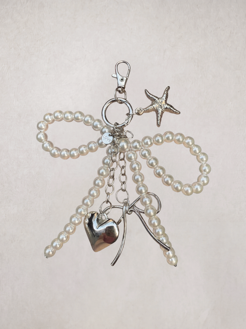 Pearl Bow Charm keychain with heart, star, and bow-shaped pearl beads, product shot