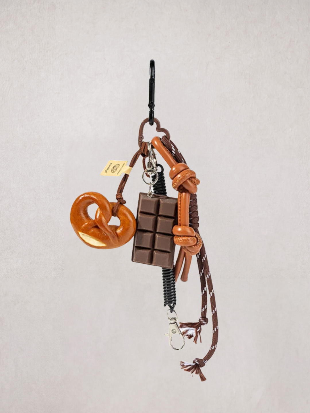 Pretzel Charm keychain without a smiling face design, close-up product shot